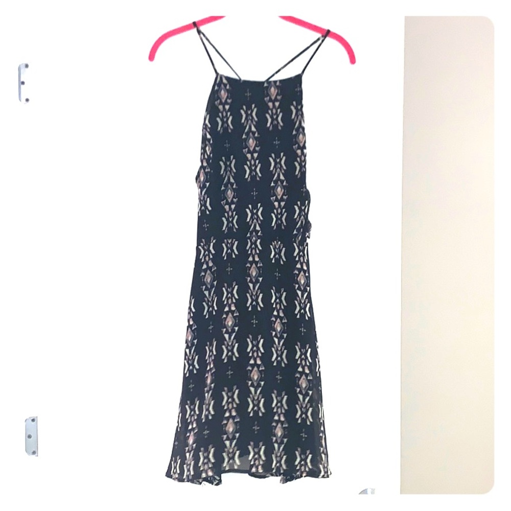 Fun sheer navy dress with detailed back!